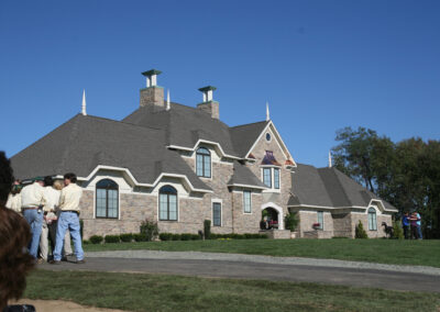 extreme home makeover new shingle and copper roof installation by Cranford Contractors, Inc.